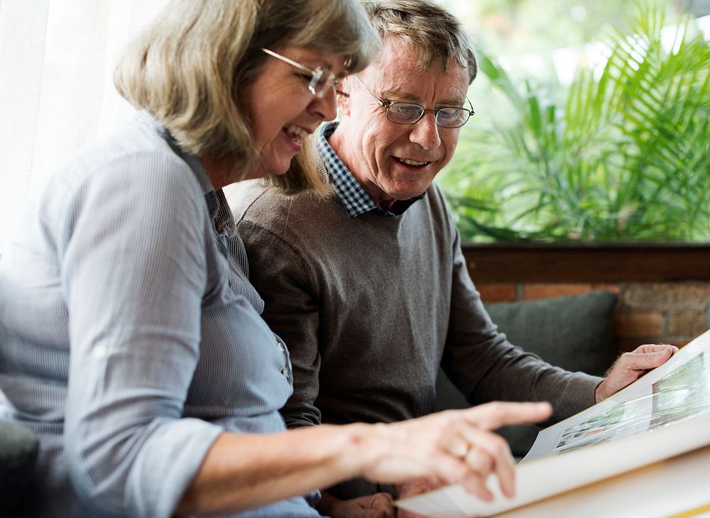 Mature Couple Reading Books Together