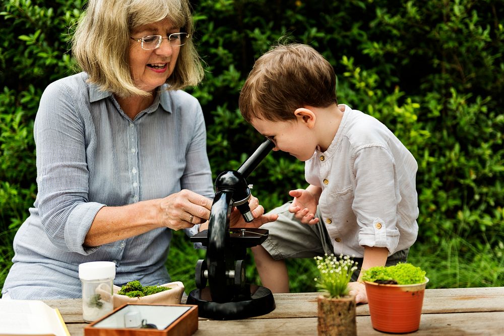 Little Kid Experimenting Science Microscope