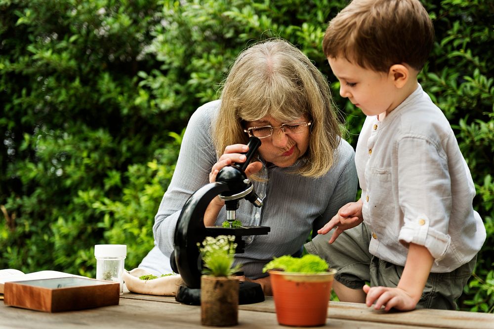Little Kid Experimenting Science Microscope