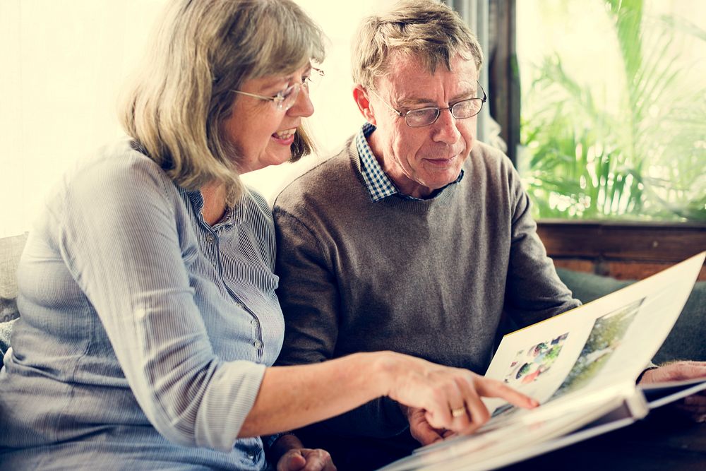 Mature Couple Reading Books Together