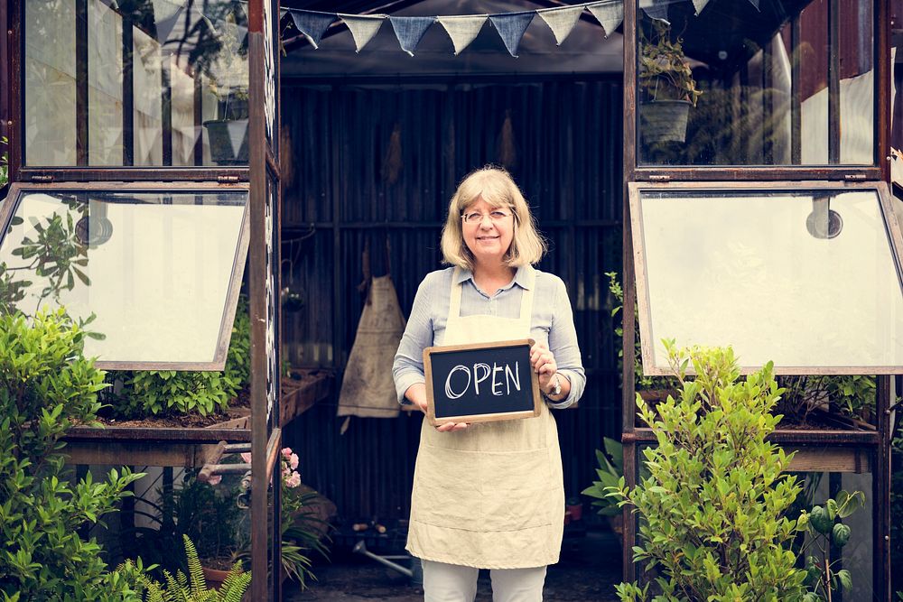 Mature Lady Open Sign Garden Shop