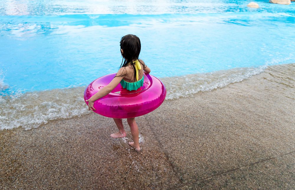Little Girl Holding Swimming Buoy Playful Pool Happiness
