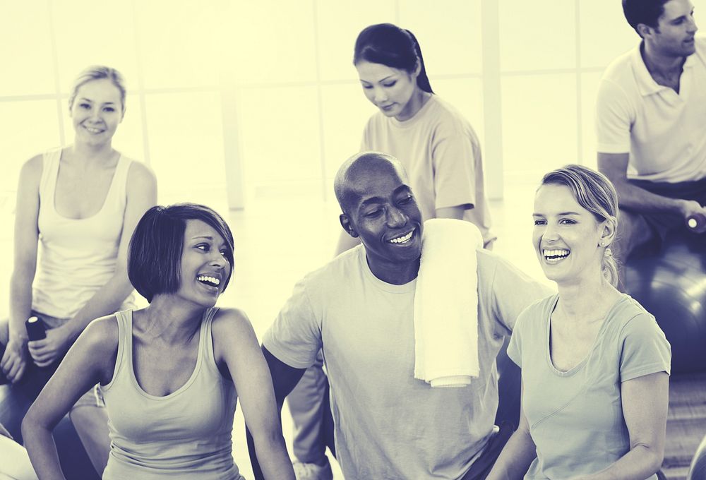 Diverse group of adults exercising 