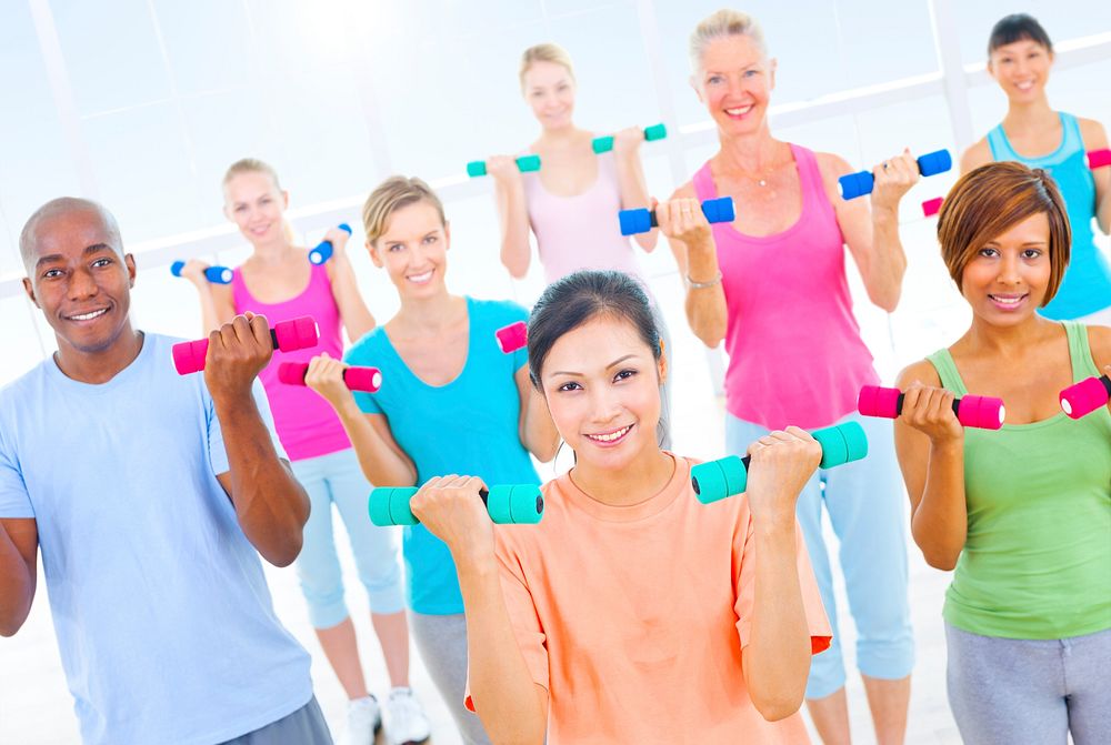 Diverse group of adults exercising 
