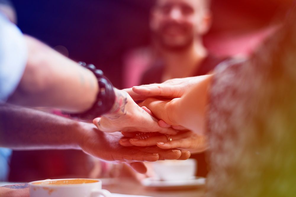 Group of friends hands stack for support team