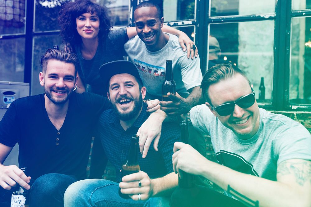 Group of Diverse People Drink Beers Together