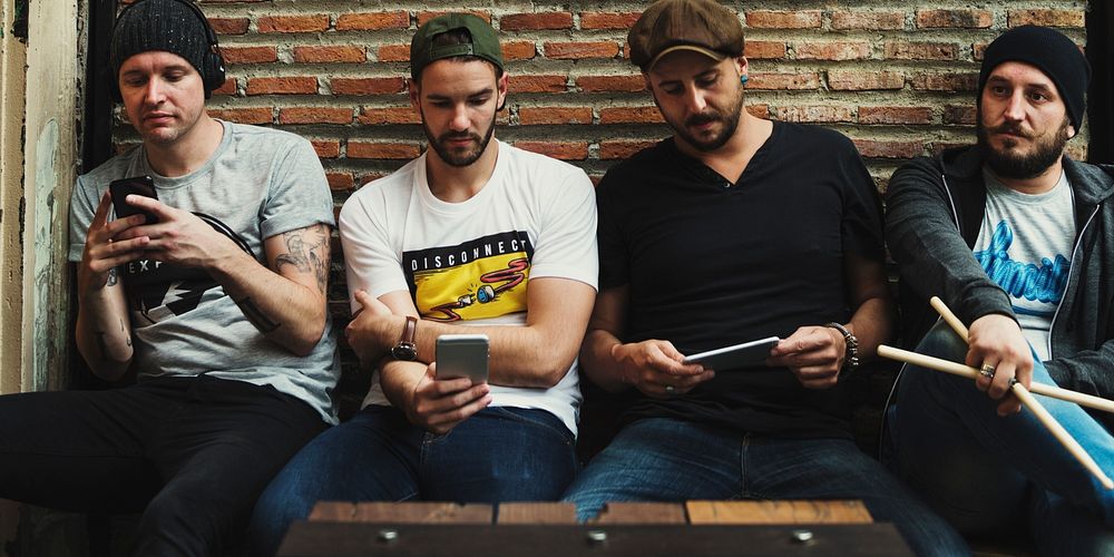 Adult Men Sit Together Use Mobile Phone