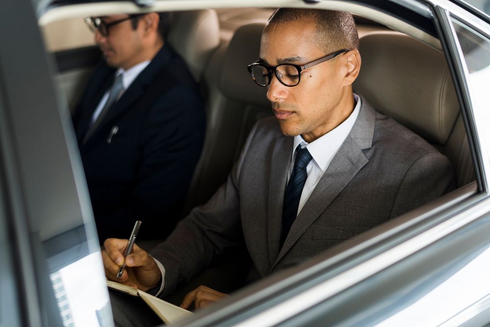 Businessman Hand Write Note Sit Car