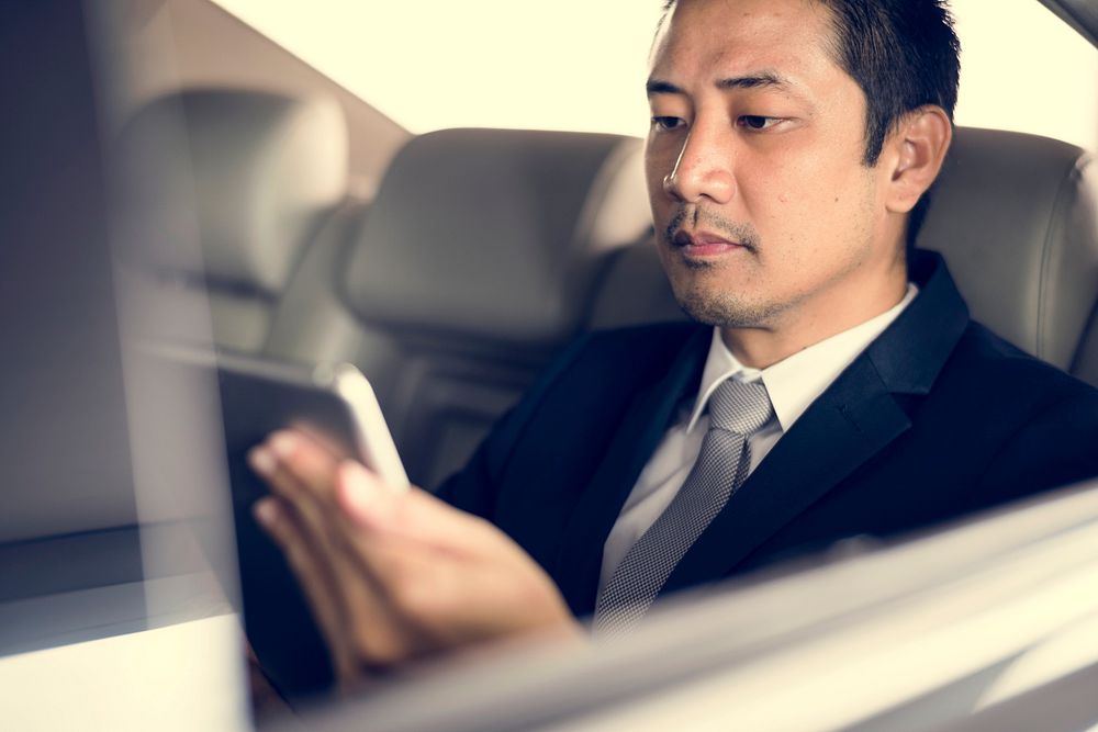 Businessman Sit Inside Car Use Mobile