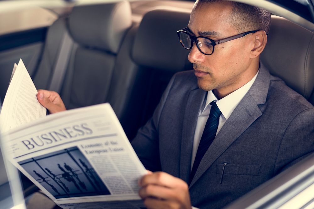 Business Man Sit Inside Car Read Newspaper