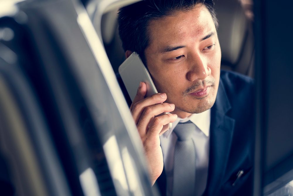 Businessman Sit Inside Car Use Mobile