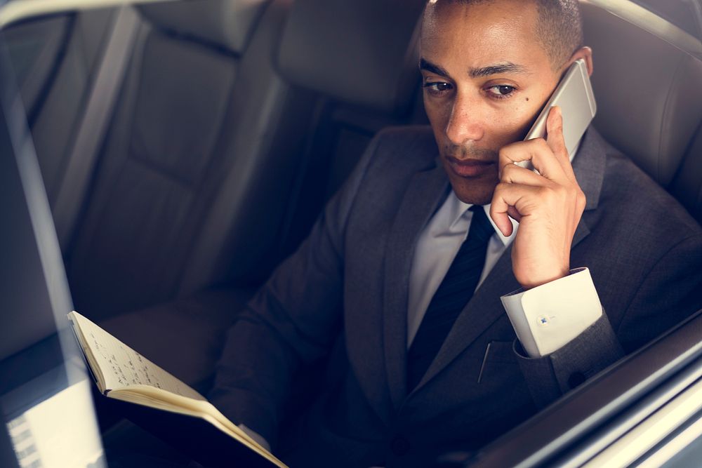 Businessman Use Mobile Talk Car