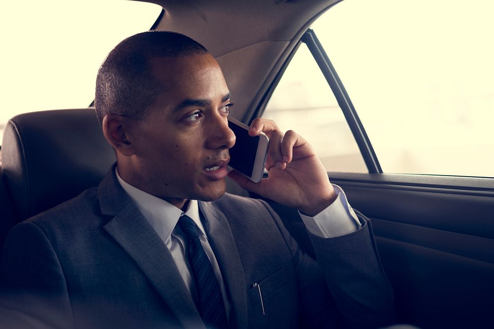 Businessman Use Mobile Talk Car