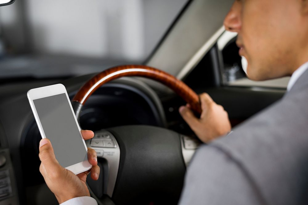 Businessman Use Mobile Inside Car