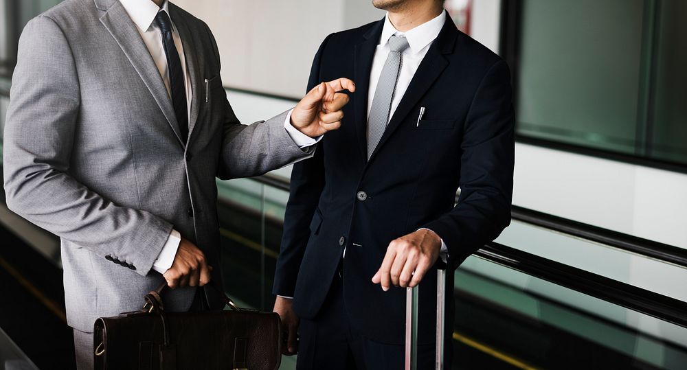 Business Men Travel Luggage Escalator Talk