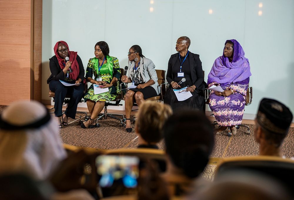 A Group of Business Woman Having a Discussion in a Panel with Audiences 