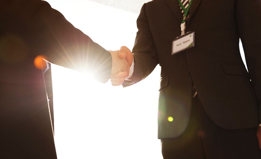 Two Business Men Shaking Hands 