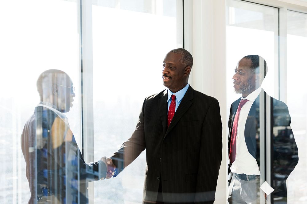 Three African Descent Business Men Introducing Themselves 