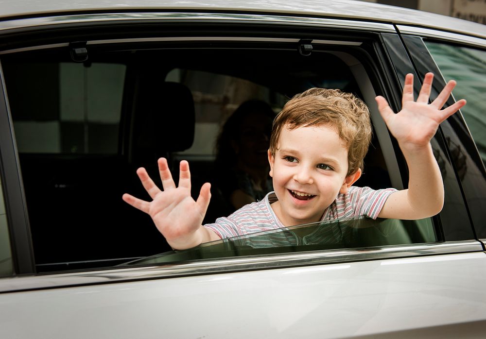Boy CHild in Car Cheerful Smiling Greeting