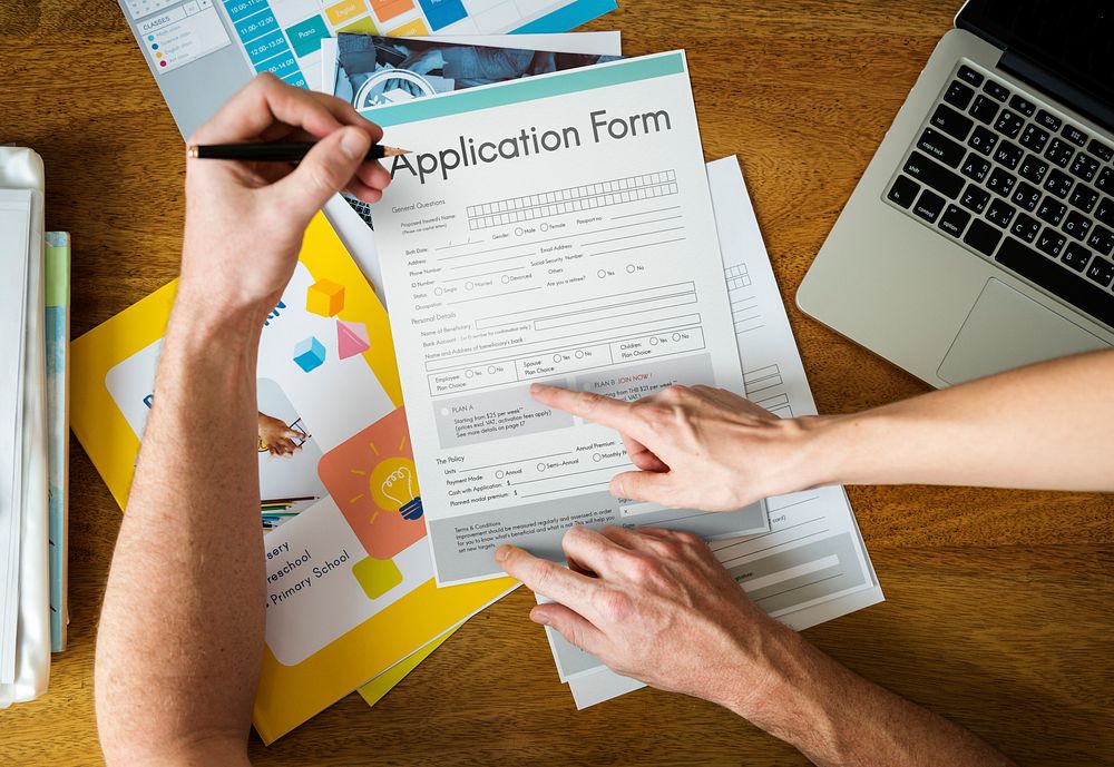 Man Filling Applicatio Form Documents Information
