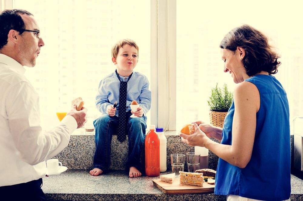 Happiness family having breakfast together