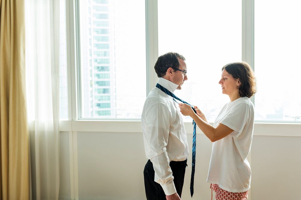 Wife Wearing Necktie to Husband Routine Life