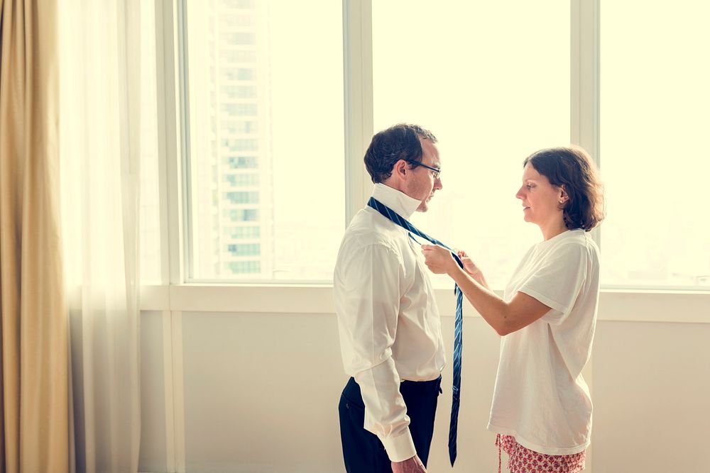 Wife Wearing Necktie to Husband Routine Life