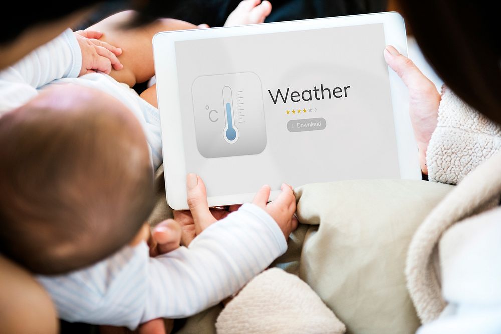 Baby using digital device with parent network graphic overlay