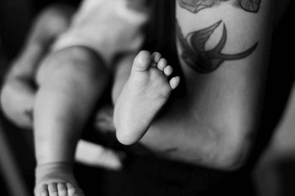 Closeup of baby feet grayscale