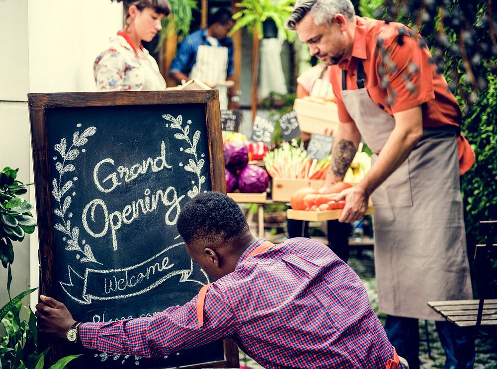 Group of friends with vegetable shop together