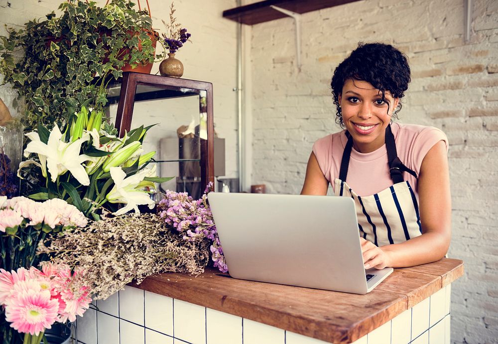 Woman Using Laptop Online Flower Shop