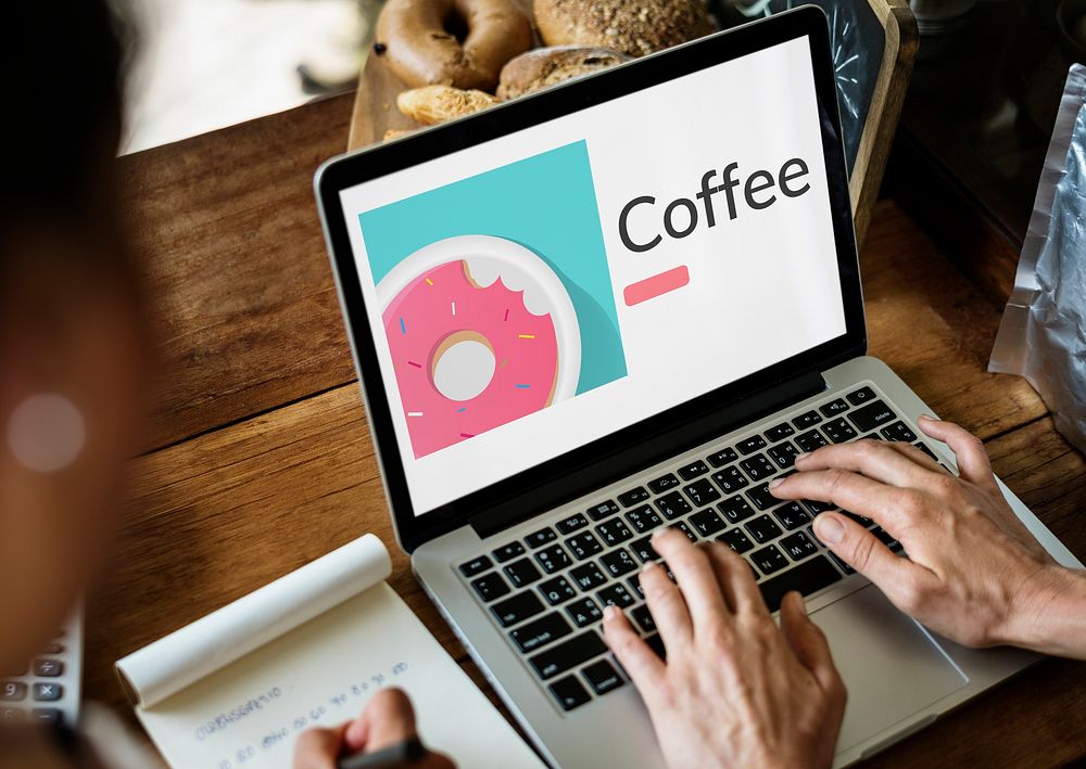 Illustration of sweet dessert donut pastry on laptop