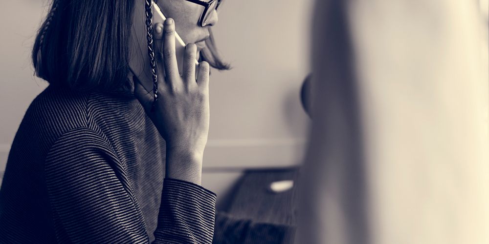 Woman Glasses Talking Holding Phone