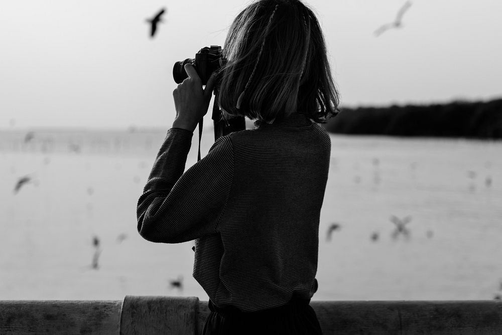 Woman Taking Snap Photo with Camera Wanderlust