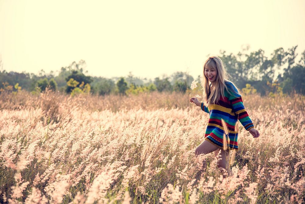 Young girl enjoying the meadows