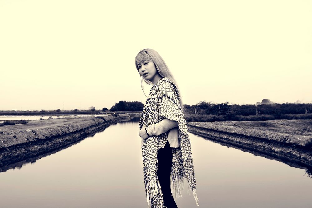 Traveler Woman on a journey near by pond