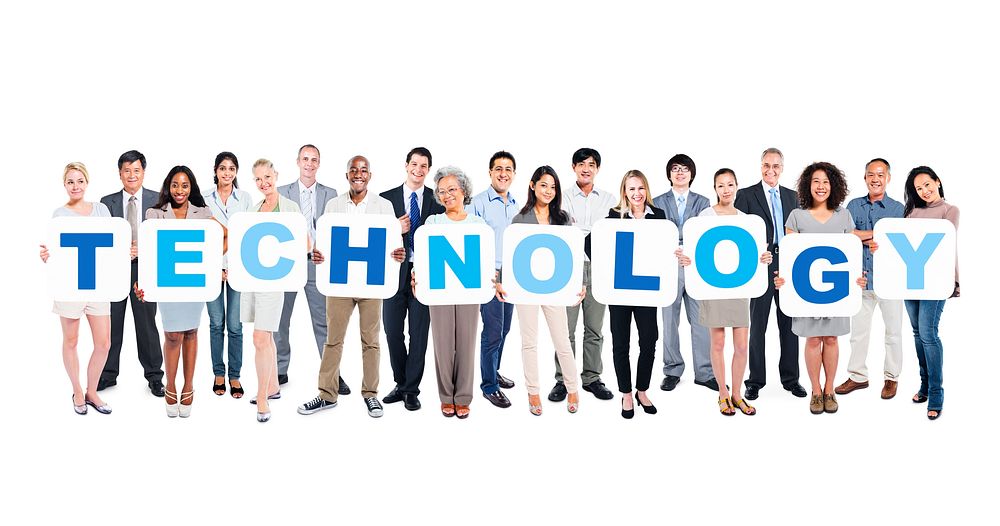 Group Of Business People Holding The Word Technology