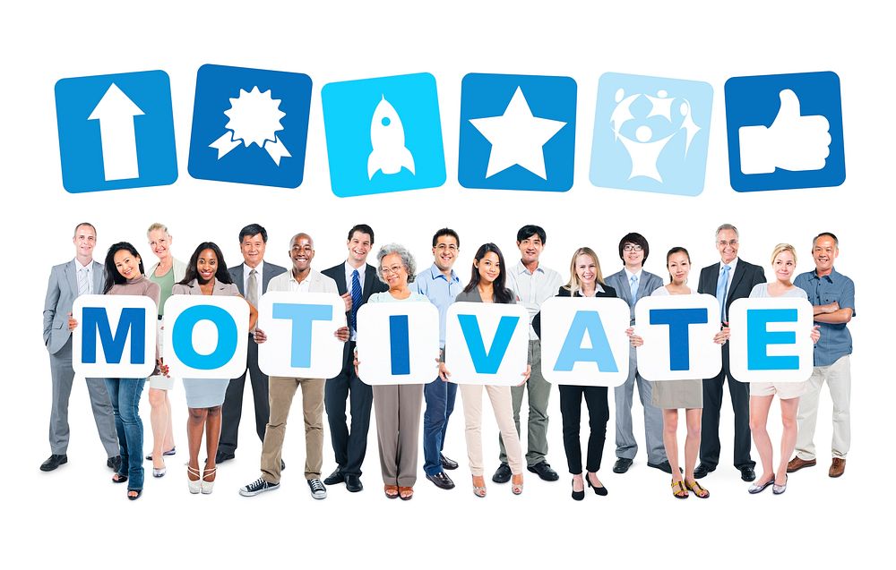 Group of Business People Holding White Placards Forming the Word "MOTIVATE" with Icons Above Them