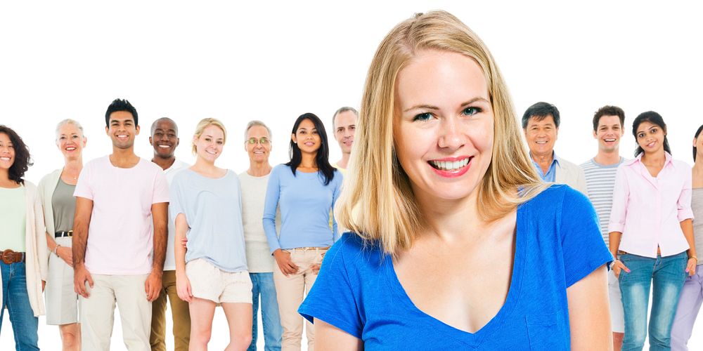 Young Adult Woman Standing Out From Crowd Concept