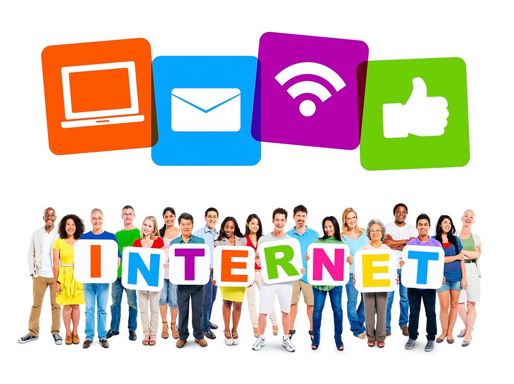 Multi-Ethnic Group Of People Holding Alphabet To Form Internet And Internet Themed Images Above