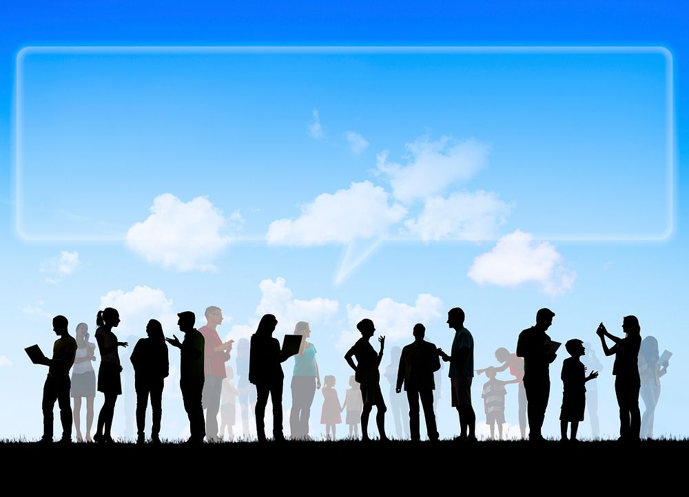 Group Of Multi-Ethnic People Social Networking Outdoors And Empty Billboard Speech Bubble Above