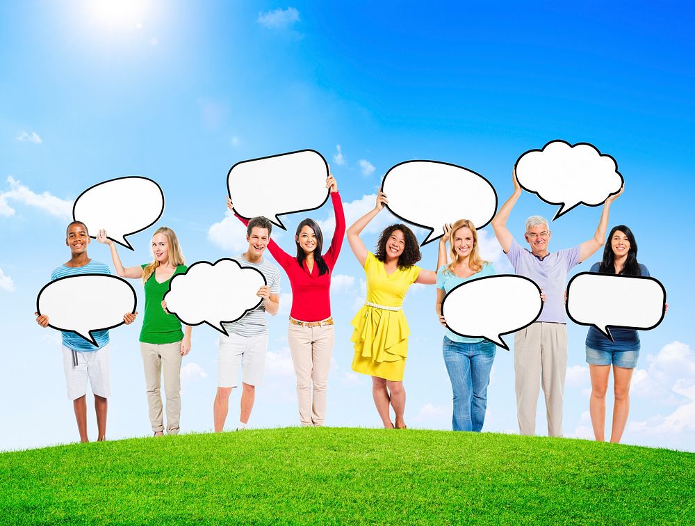 Group of Diverse Multi-Ethnic People Outdoors Holding Empty Speech Bubbles
