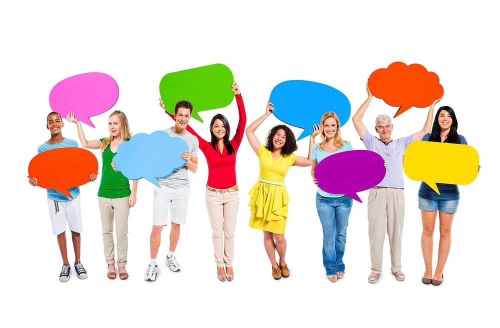 Group Of Happy Multi-Ethnic People Holding Colorful Empty Speech Bubbles