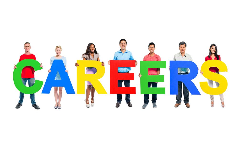 Group of Business people holding the letter "CAREER"