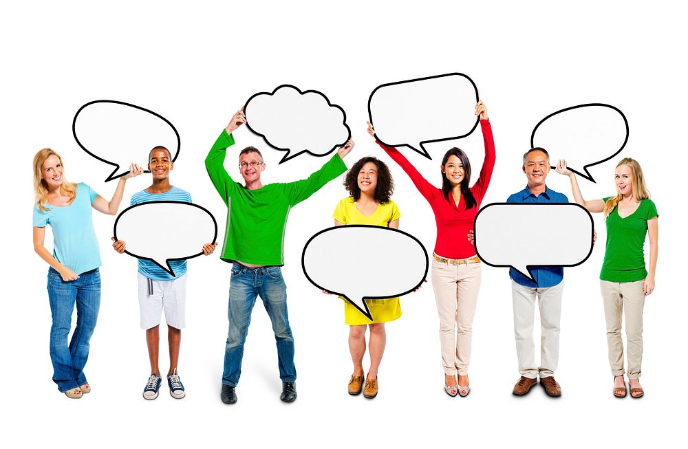 Group of multi-ethnic people standing with speech bubbles in their hands.