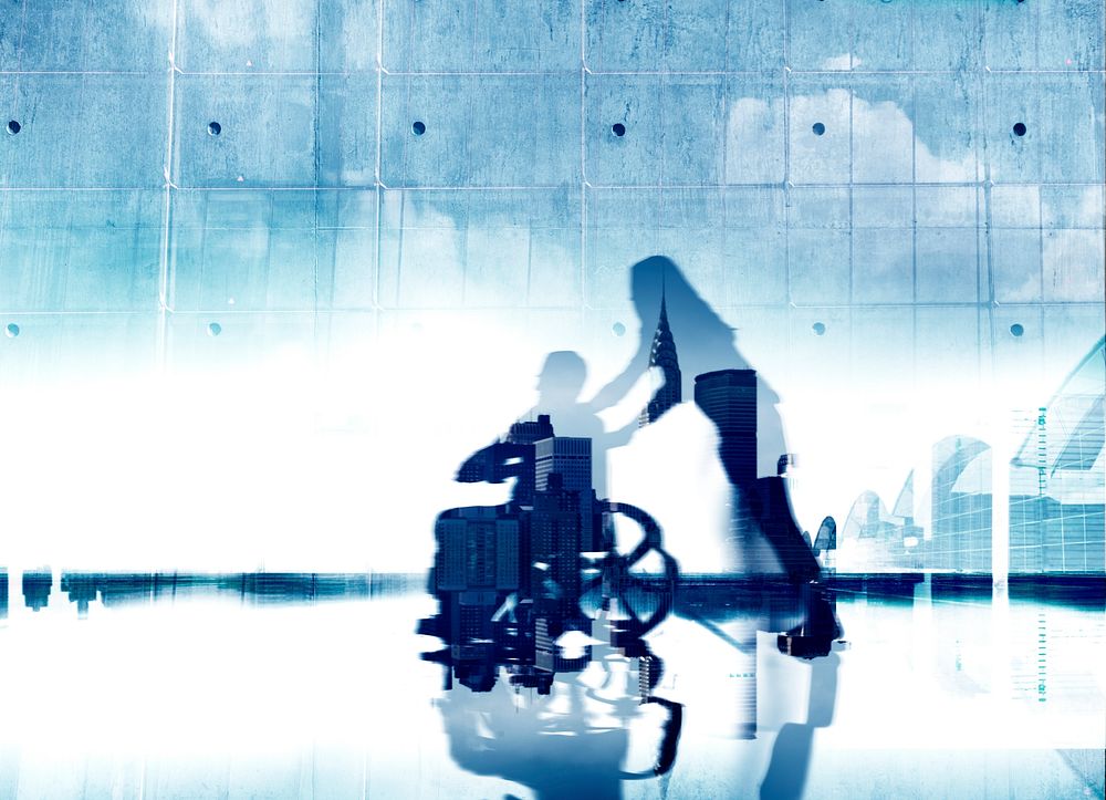 Silhouette of a person in a wheelchair