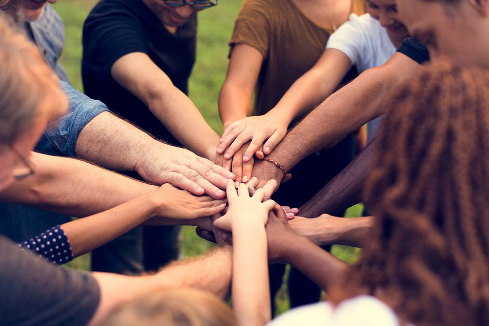 Group of diversity people hands stack support together
