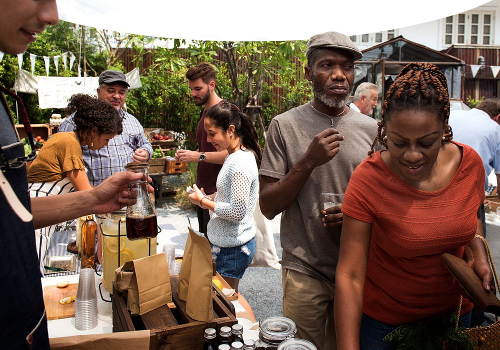 Group of Diverse People Shop At Farmers Market