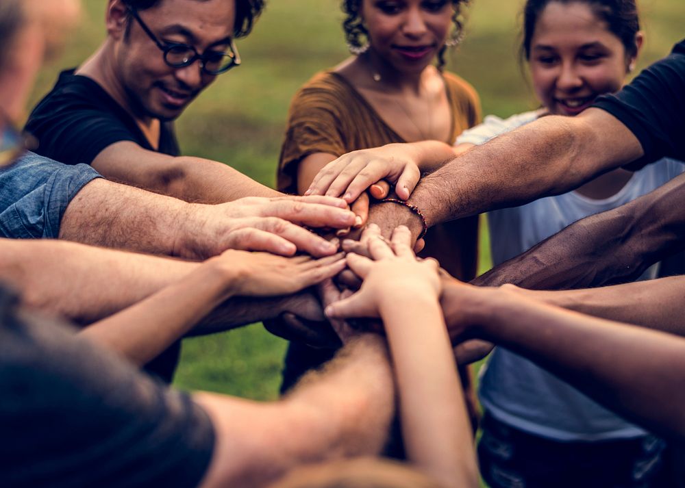 Group of diversity people hands stack support together