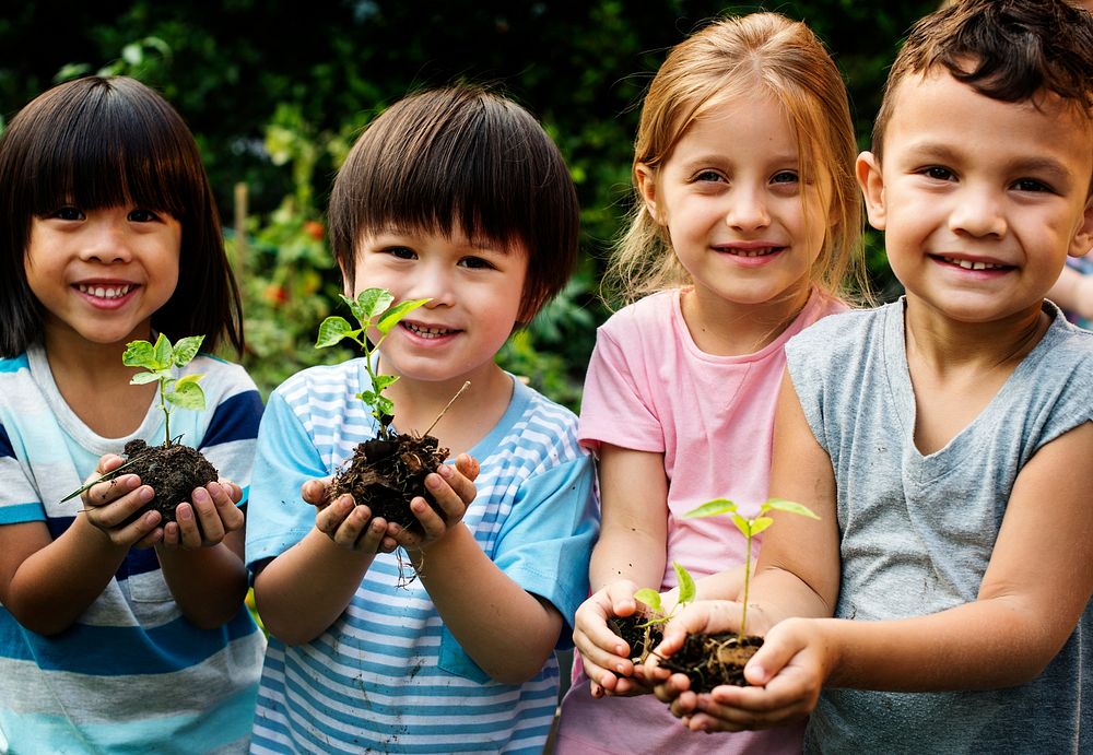 Group of kindergarten kids friends gardening agriculture